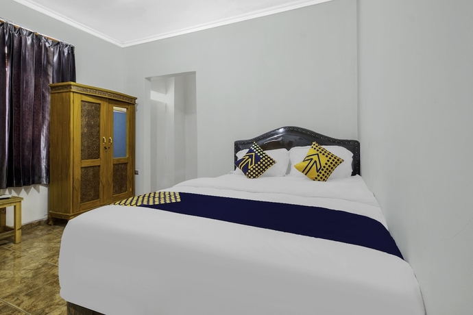 Imagen de la habitación del Hotel OYO Life 2412 Mandala Residence. Foto 11