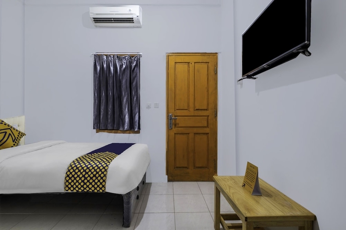 Imagen de la habitación del Hotel OYO Life 2412 Mandala Residence. Foto 12