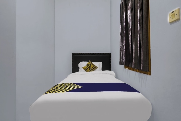 Imagen de la habitación del Hotel OYO Life 2412 Mandala Residence. Foto 13