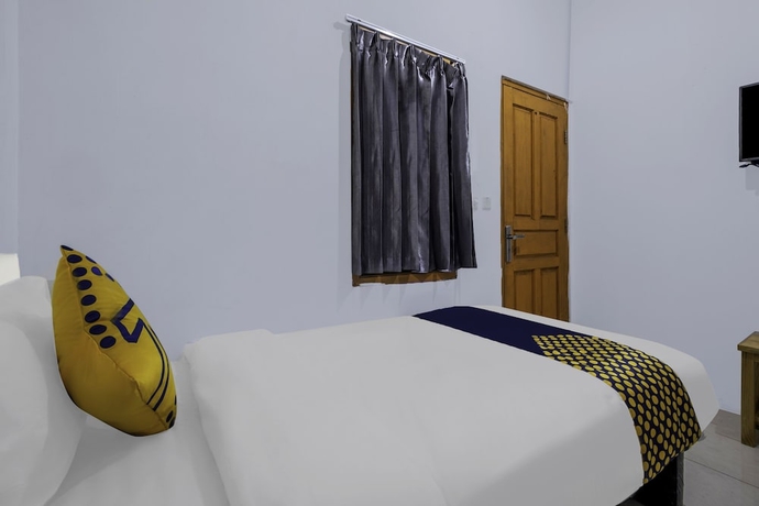 Imagen de la habitación del Hotel OYO Life 2412 Mandala Residence. Foto 14