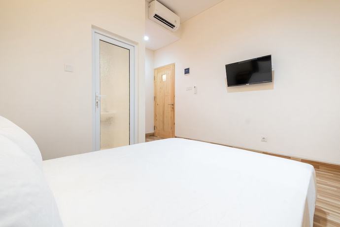 Imagen de la habitación del Hotel OYO Life 2801 Sari Panguripan (Kos Putri and Pasutri). Foto 4