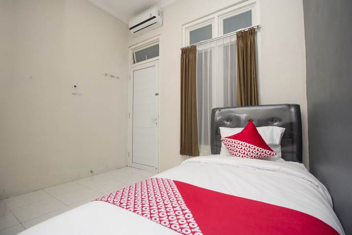 Imagen de la habitación del Hotel OYO Life 647 Irooms Homestay. Foto 2