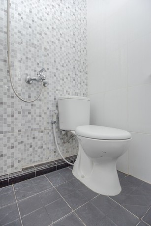 Imagen de la habitación del Hotel OYO Life 647 Irooms Homestay. Foto 5