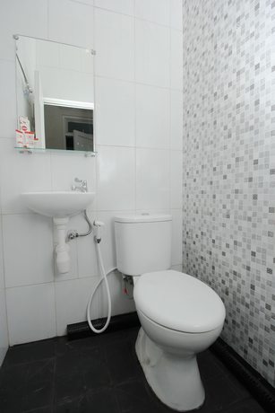 Imagen de la habitación del Hotel OYO Life 647 Irooms Homestay. Foto 6