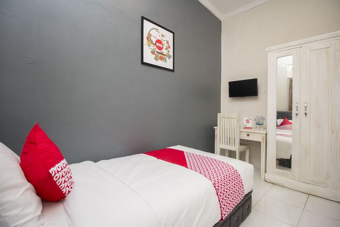 Imagen de la habitación del Hotel OYO Life 647 Irooms Homestay. Foto 9