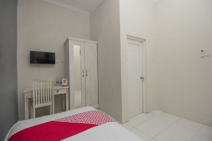 Imagen de la habitación del Hotel OYO Life 647 Irooms Homestay. Foto 10