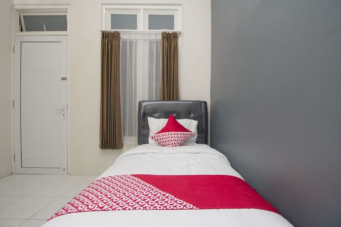 Imagen de la habitación del Hotel OYO Life 647 Irooms Homestay. Foto 12