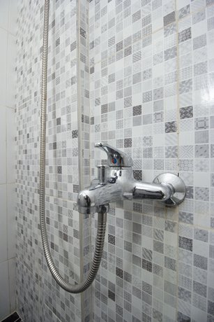 Imagen de la habitación del Hotel OYO Life 647 Irooms Homestay. Foto 14