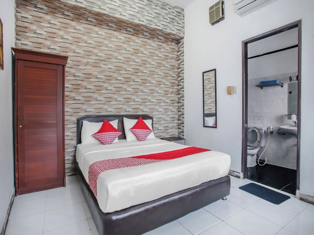 Imagen de la habitación del Hotel OYO Life 90091 Wisma Pakuan Syariah. Foto 10