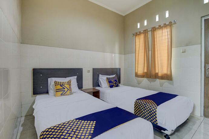 Imagen de la habitación del Hotel OYO Life 90159 Puri Asoka Guest House. Foto 20