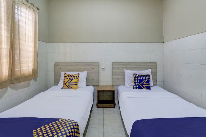 Imagen de la habitación del Hotel OYO Life 90159 Puri Asoka Guest House. Foto 3