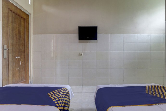 Imagen de la habitación del Hotel OYO Life 90159 Puri Asoka Guest House. Foto 4