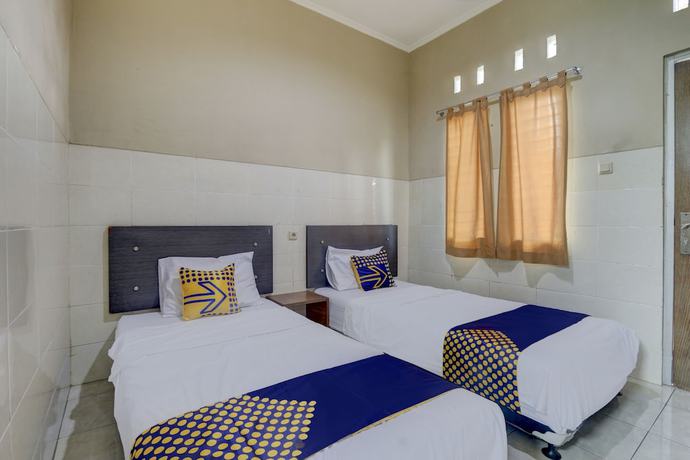 Imagen de la habitación del Hotel OYO Life 90159 Puri Asoka Guest House. Foto 6