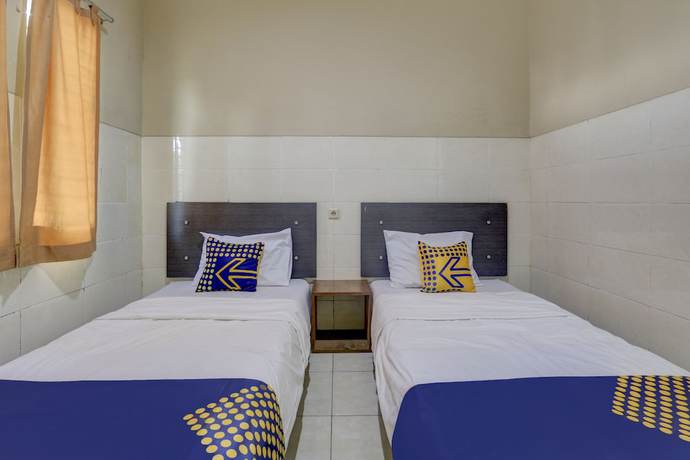 Imagen de la habitación del Hotel OYO Life 90159 Puri Asoka Guest House. Foto 8