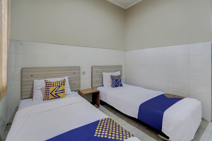 Imagen de la habitación del Hotel OYO Life 90159 Puri Asoka Guest House. Foto 12