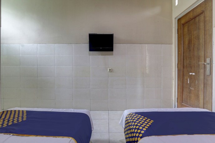 Imagen de la habitación del Hotel OYO Life 90159 Puri Asoka Guest House. Foto 13