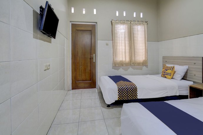 Imagen de la habitación del Hotel OYO Life 90159 Puri Asoka Guest House. Foto 15