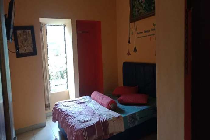 Imagen de la habitación del Hotel OYO Life 90646 Villa Karsinem Pasuruan. Foto 6