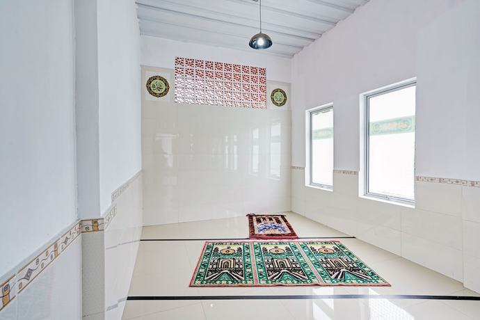 Imagen de los interiores del Hotel OYO Life 90678 Omah Kulo Guest House. Foto 11