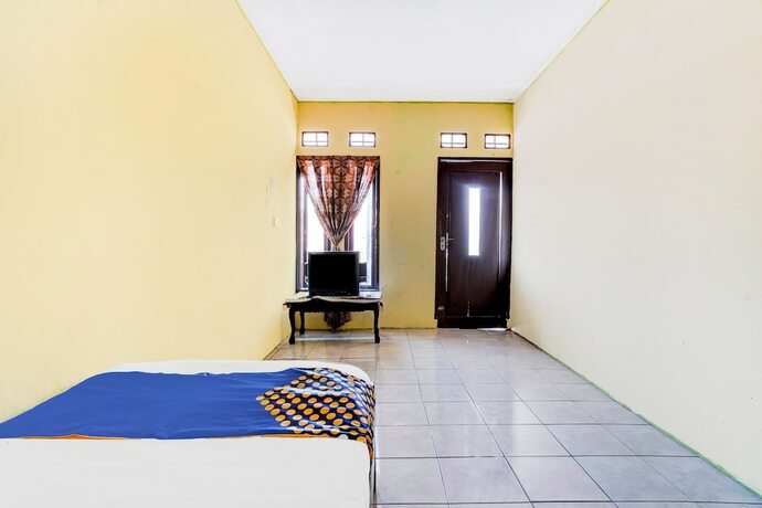 Imagen de la habitación del Hotel OYO Life 90701 Kost Syariah Deris. Foto 19
