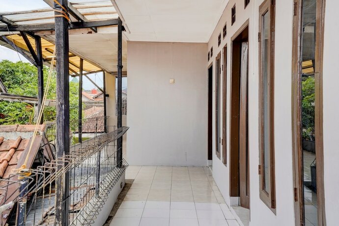 Imagen general del Hotel OYO Life 90701 Kost Syariah Deris. Foto 12