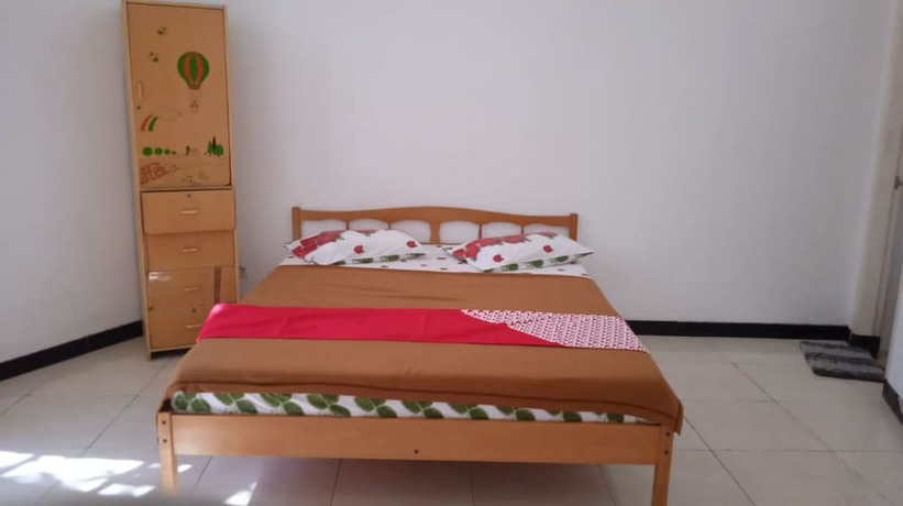 Imagen de la habitación del Hotel OYO Life 90989 Lee Dug Tretes Residence. Foto 3