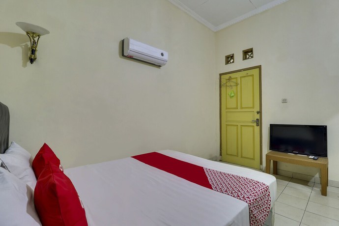 Imagen de la habitación del Hotel OYO Life 91205 Rindang Guesthouse Syariah. Foto 3