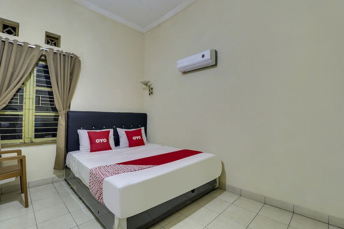 Imagen de la habitación del Hotel OYO Life 91205 Rindang Guesthouse Syariah. Foto 4