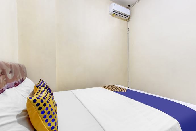 Imagen de la habitación del Hotel OYO Life 91374 Asia Stay Semarang Syariah. Foto 2