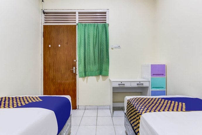 Imagen de la habitación del Hotel OYO Life 91374 Asia Stay Semarang Syariah. Foto 3
