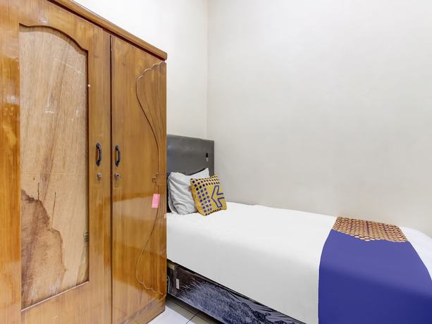 Imagen de la habitación del Hotel OYO Life 91374 Asia Stay Semarang Syariah. Foto 5