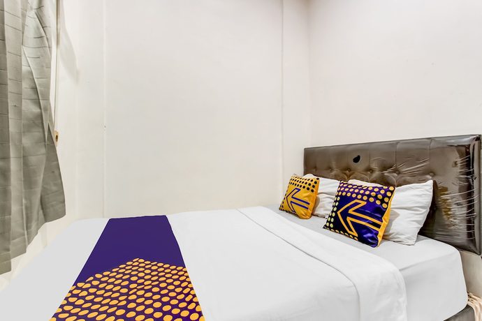 Imagen de la habitación del Hotel OYO Life 91374 Asia Stay Semarang Syariah. Foto 9