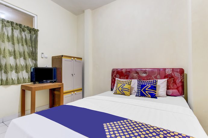 Imagen de la habitación del Hotel OYO Life 91374 Asia Stay Semarang Syariah. Foto 11
