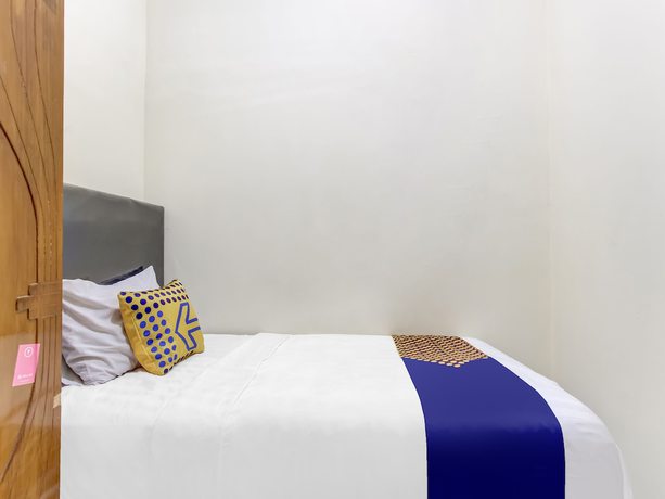 Imagen de la habitación del Hotel OYO Life 91374 Asia Stay Semarang Syariah. Foto 12