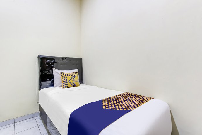 Imagen de la habitación del Hotel OYO Life 91374 Asia Stay Semarang Syariah. Foto 15