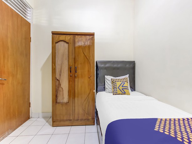 Imagen de la habitación del Hotel OYO Life 91374 Asia Stay Semarang Syariah. Foto 16