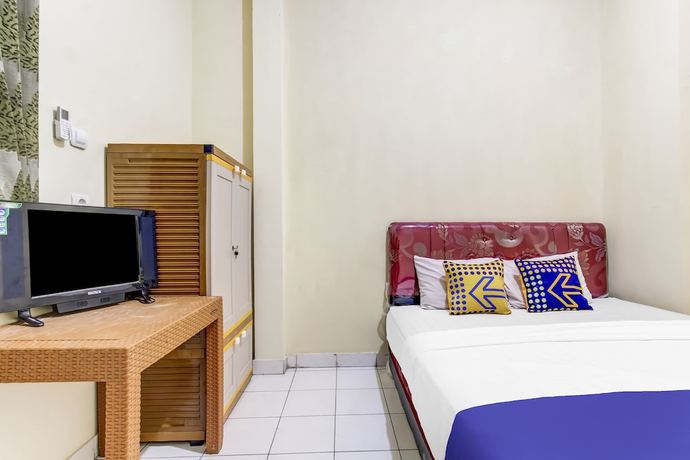 Imagen de la habitación del Hotel OYO Life 91374 Asia Stay Semarang Syariah. Foto 18