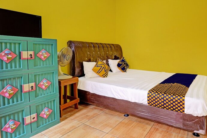 Imagen de la habitación del Hotel OYO Life 91478 Wisma Aura Syariah. Foto 20