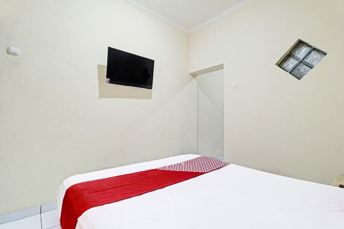Imagen de la habitación del Hotel OYO Life 91480 Putridapisa Syariah. Foto 8