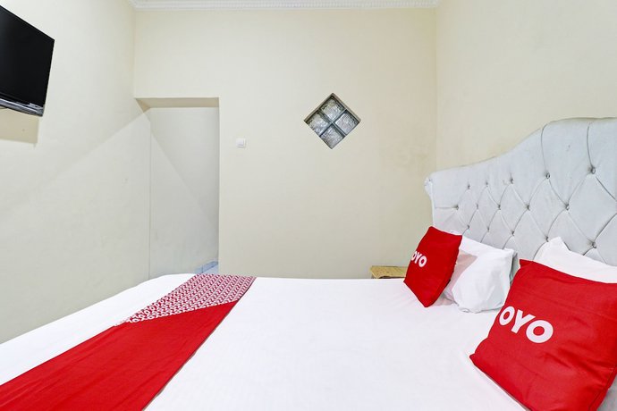 Imagen de la habitación del Hotel OYO Life 91480 Putridapisa Syariah. Foto 11