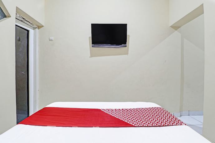 Imagen de la habitación del Hotel OYO Life 91480 Putridapisa Syariah. Foto 12