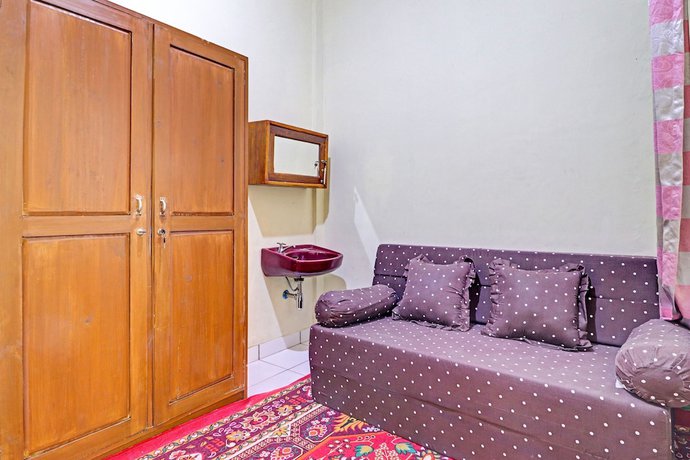 Imagen de la habitación del Hotel OYO Life 91480 Putridapisa Syariah. Foto 14