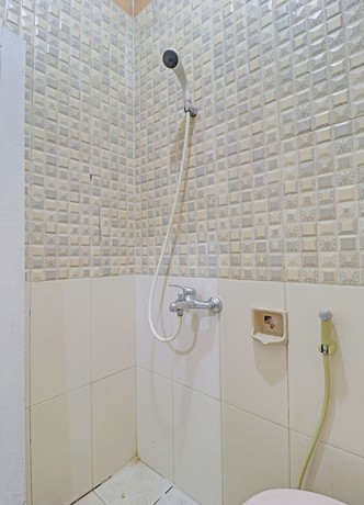 Imagen de la habitación del Hotel OYO Life 91480 Putridapisa Syariah. Foto 15