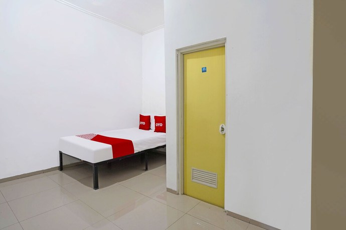 Imagen de la habitación del Hotel OYO Life 91670 Mannsur Homestay Syariah. Foto 4