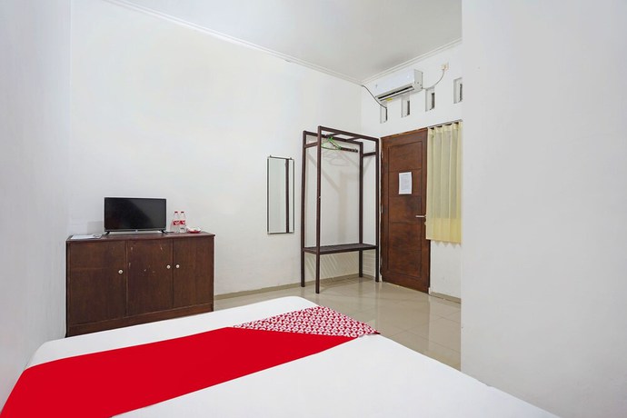 Imagen de la habitación del Hotel OYO Life 91670 Mannsur Homestay Syariah. Foto 8