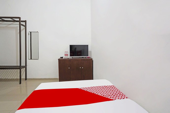 Imagen de la habitación del Hotel OYO Life 91670 Mannsur Homestay Syariah. Foto 9