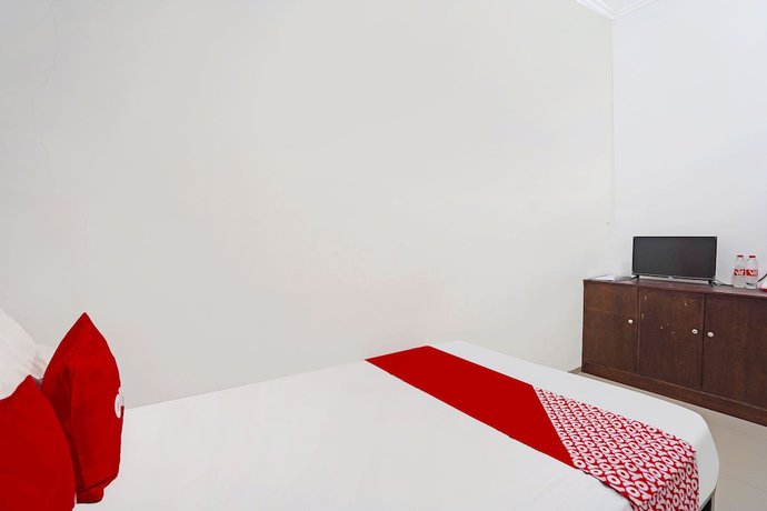 Imagen de la habitación del Hotel OYO Life 91670 Mannsur Homestay Syariah. Foto 10