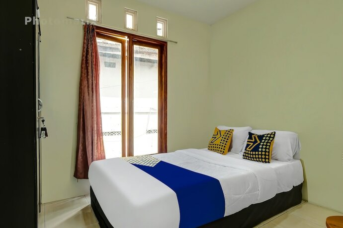 Imagen de la habitación del Hotel OYO Life 92258 Kostel 21 Syariah. Foto 20