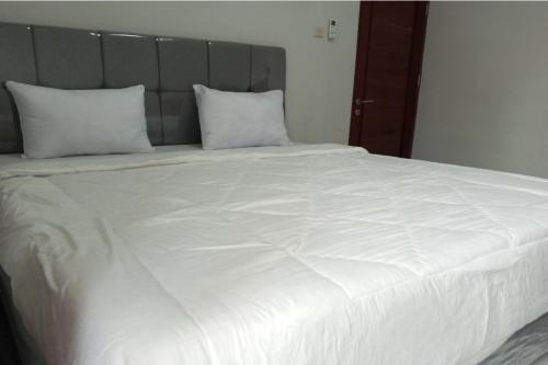 Imagen de la habitación del Hotel OYO Life 92543 Ratu Sakti Residence Syariah. Foto 19