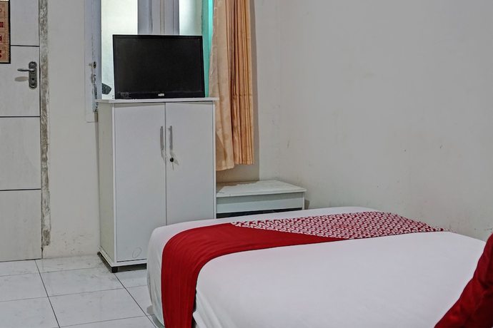 Imagen de la habitación del Hotel OYO Life 92684 Kost Mutiara Nirwana. Foto 5